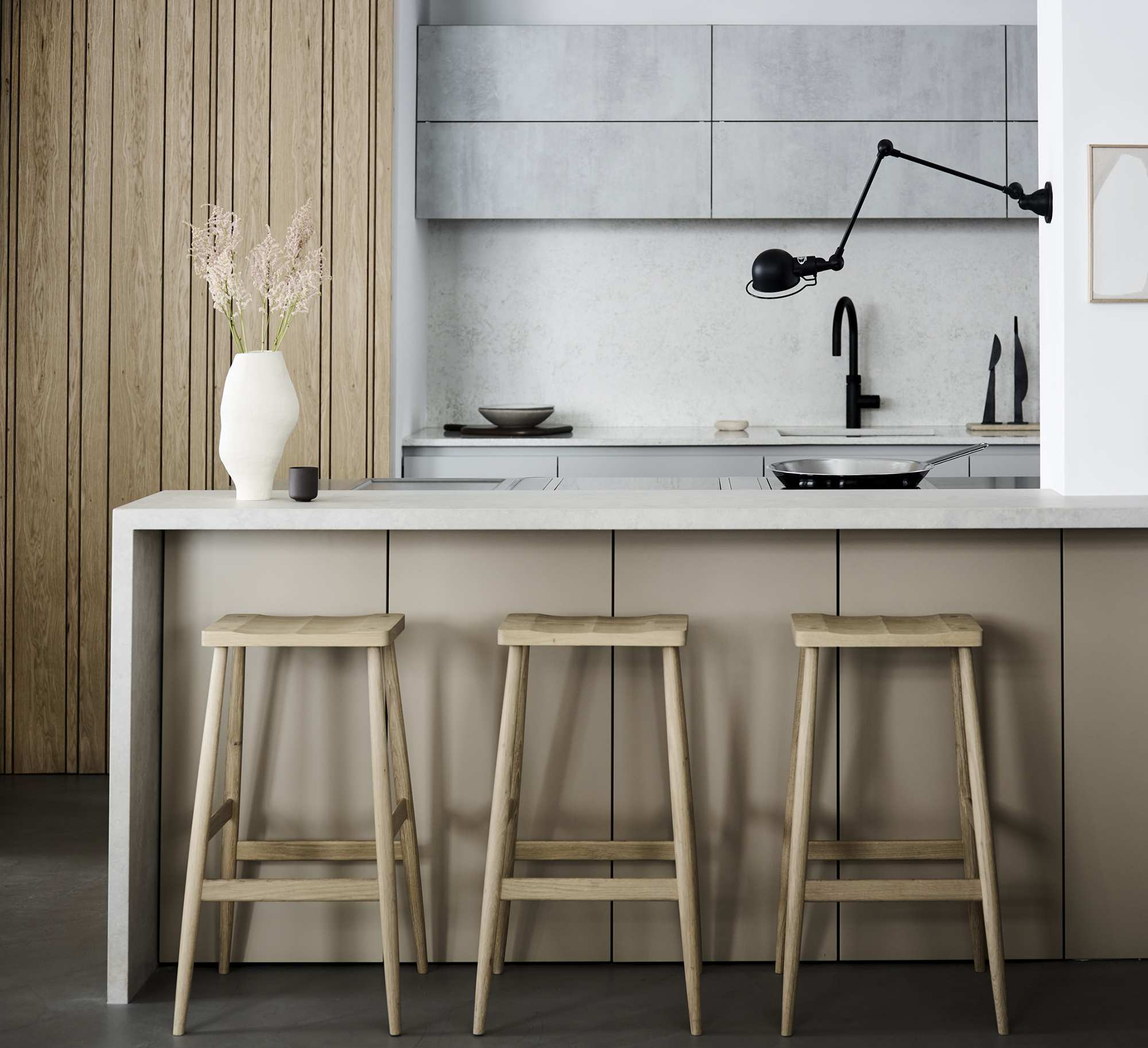 Roundhouse kitchen with wall light over the island