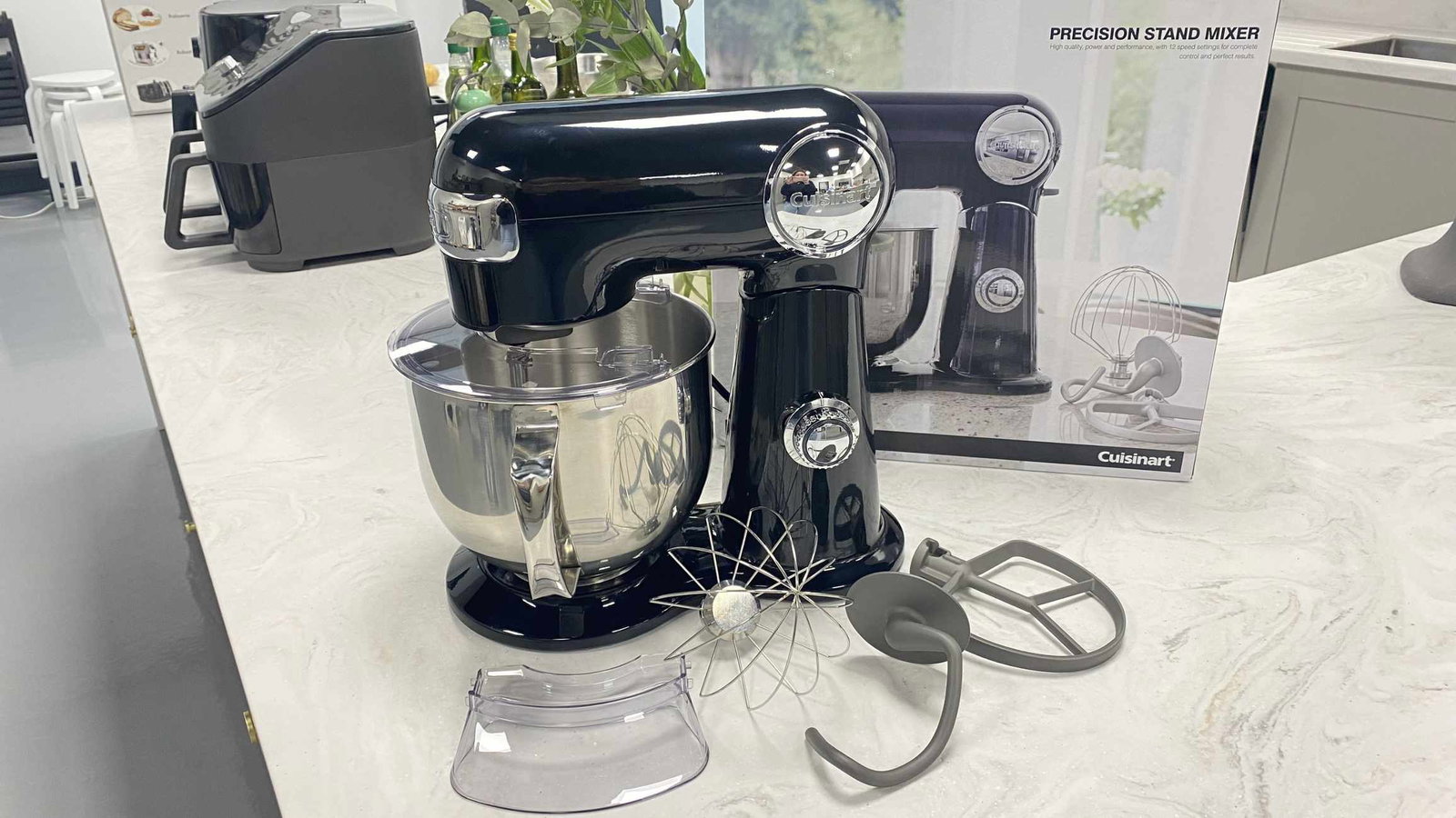 KitchenAid and Cuisinart stand mixers side-by-side