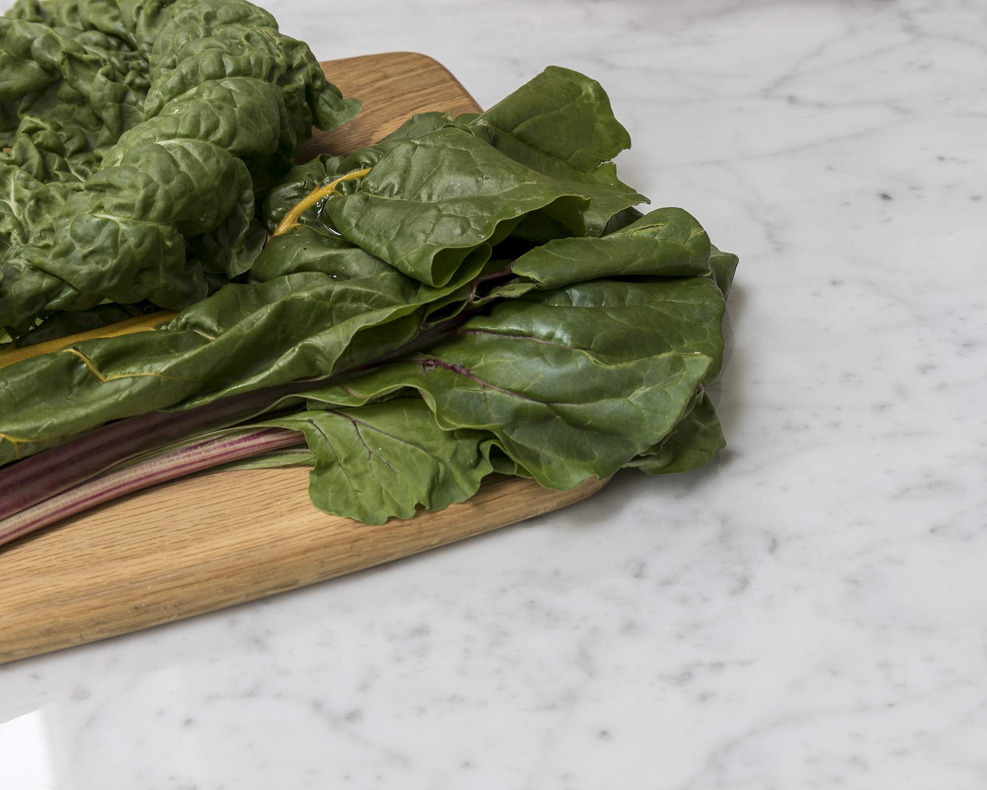 A close-up shot of spinach leaves